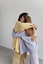 Women Hugging Each Other