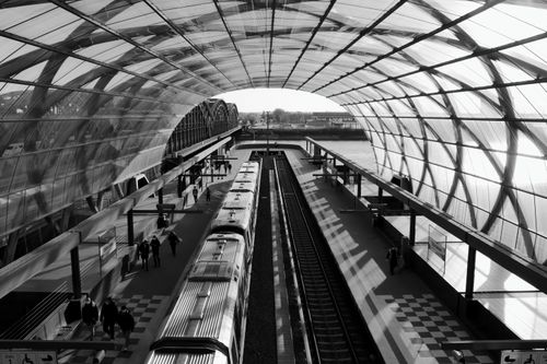 Free Captivating black and white image of a bustling, modern train station in Hamburg, Germany. Stock Photo