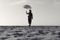 A Woman Holding an Umbrella