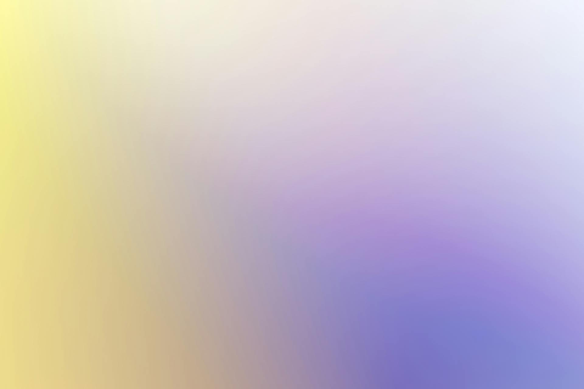 A soft and colorful abstract gradient background with smooth transitions.