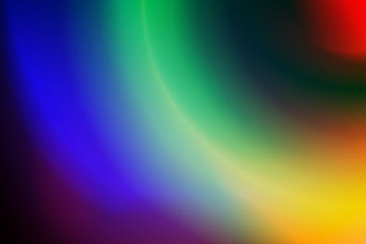 An artistic abstract background with a spectrum of vibrant colors forming a fluid gradient.