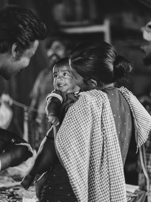 Black and White Photo of Mom Holding her Child