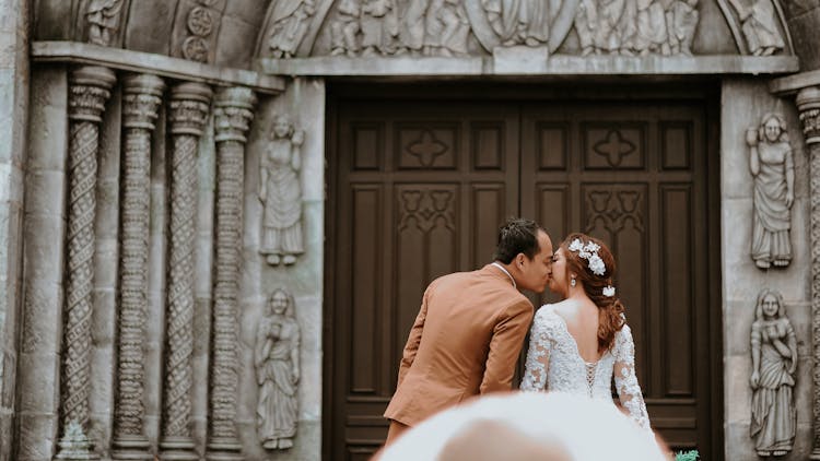 Couple Near On Wooden Sash Door