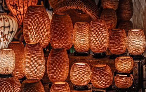 Free A collection of handmade woven lamps with warm glow indoors, showcasing traditional craftsmanship. Stock Photo