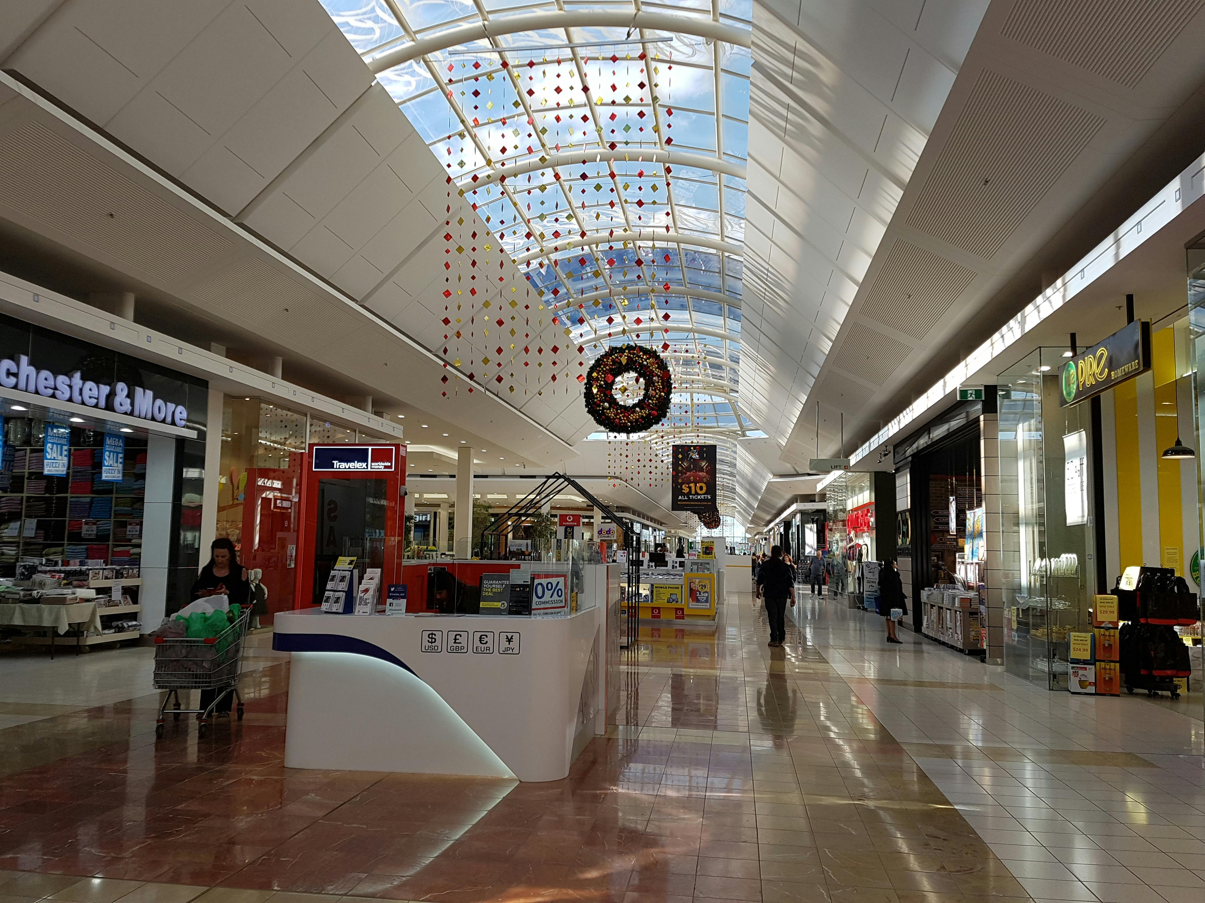 A close-up of a person playing a complex strategy game on a computer.