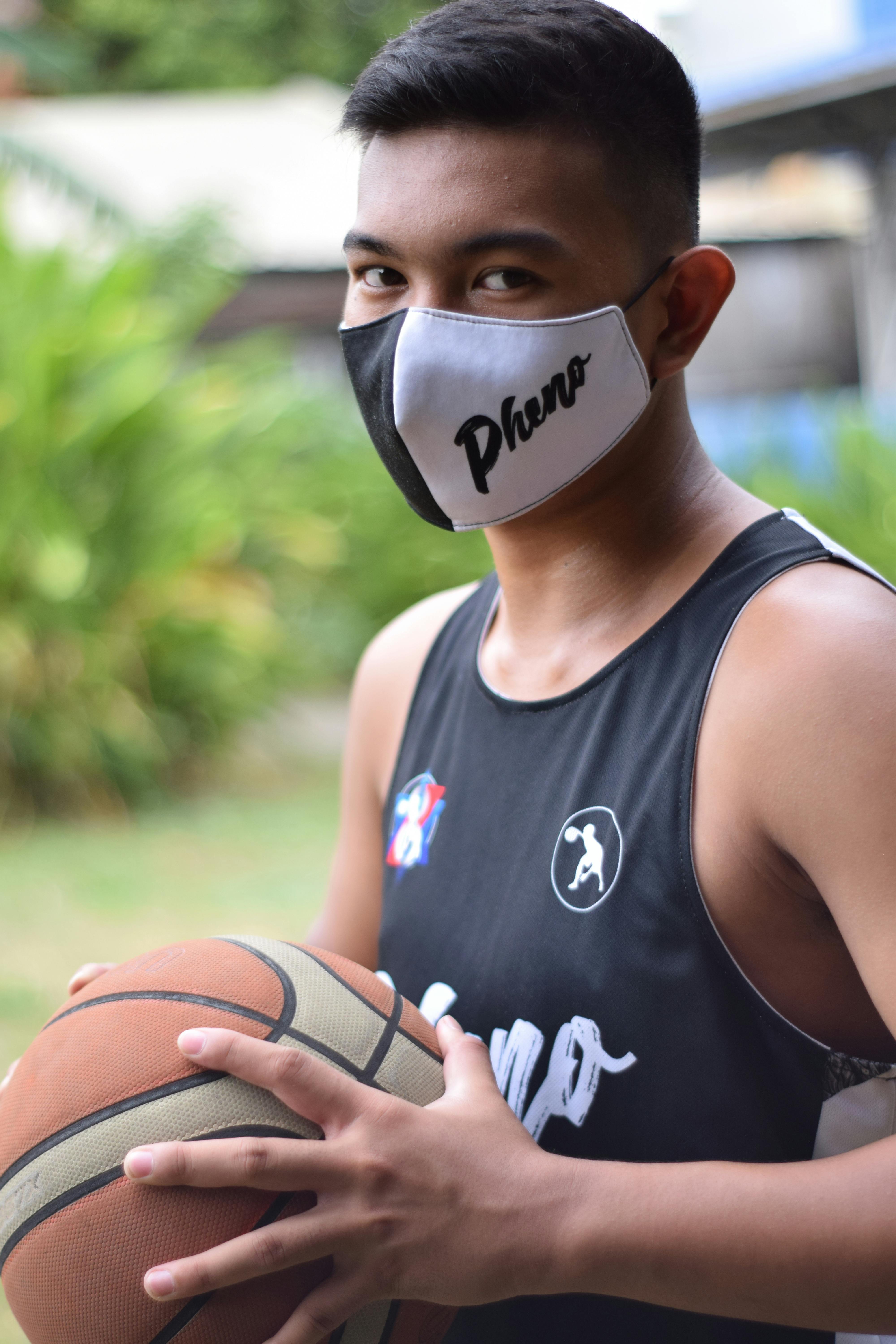 An Athlete Wearing a Face Mask · Free Stock Photo
