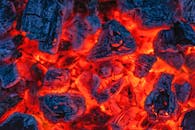Burning coals in hot bonfire