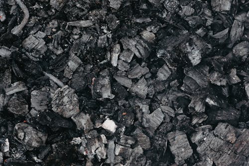 Backdrop of burnt coal with rugged surface