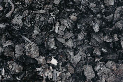 Backdrop of burnt coal with rugged surface