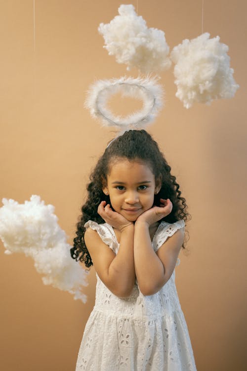Free Cute black girl in angel outfit Stock Photo