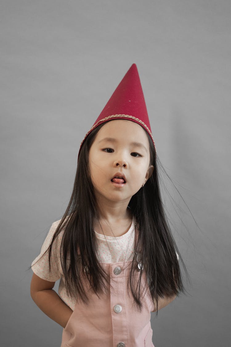 Cute Asian Girl In Gnome Cap