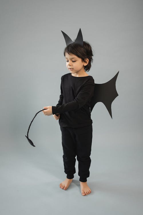 Free Cute boy in bat costume Stock Photo