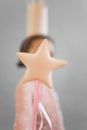 Faceless girl showing magic wand