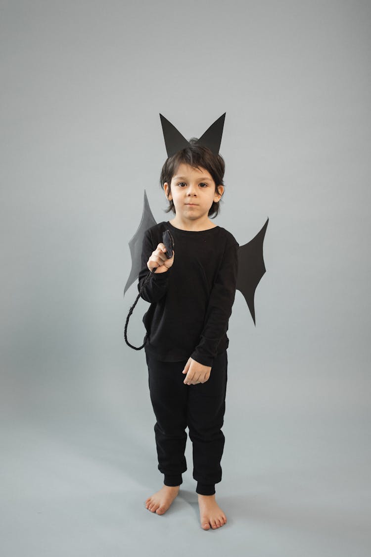 Cute Boy In Black Bat Costume