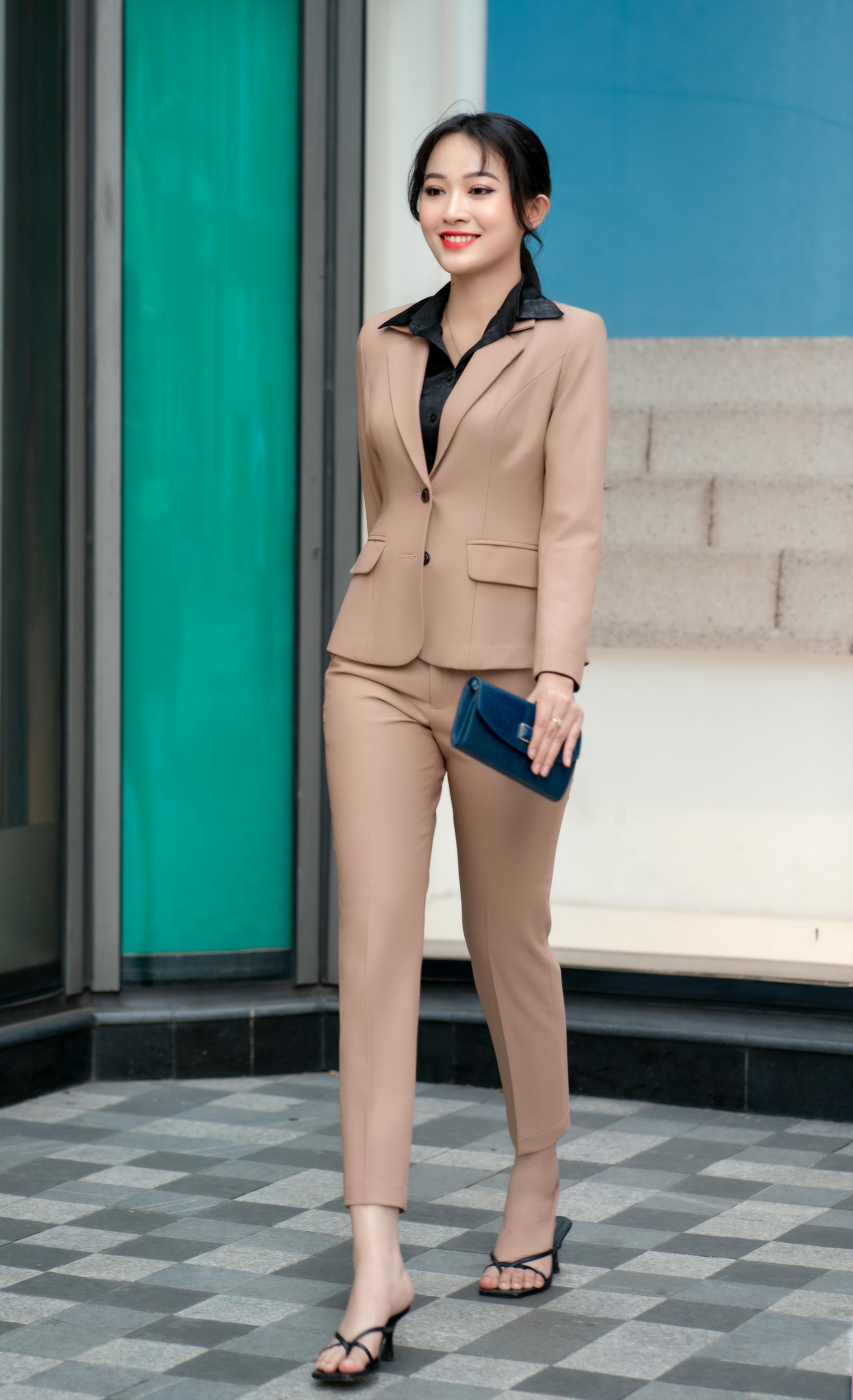 Business Attire Women Images – Browse 579,827 Stock Photos