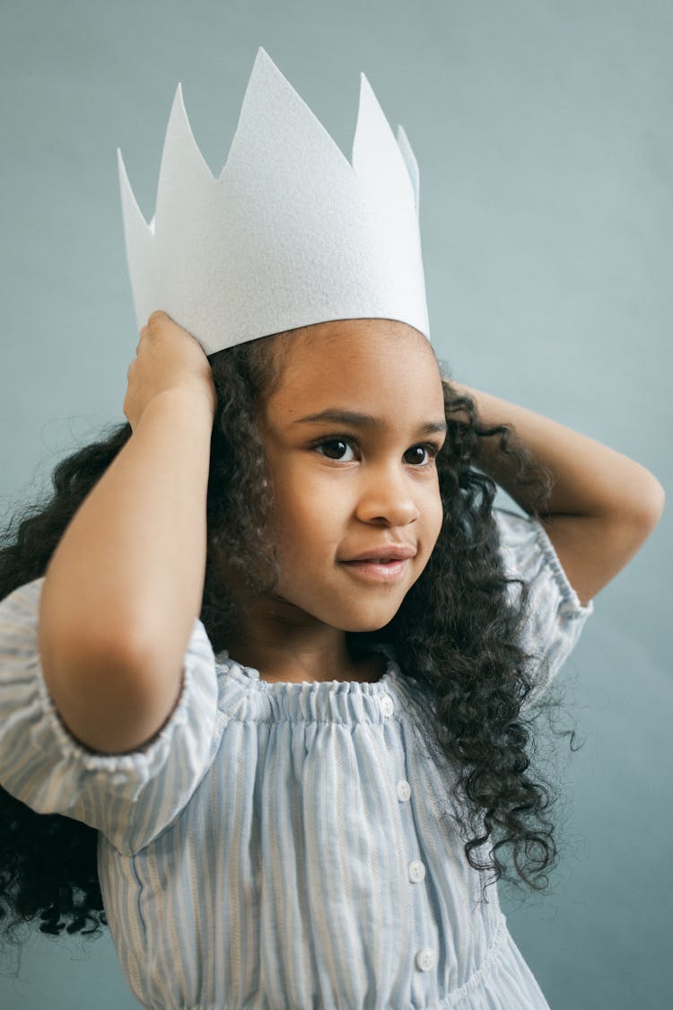 Black Girl In Paper Crown On Gray Background