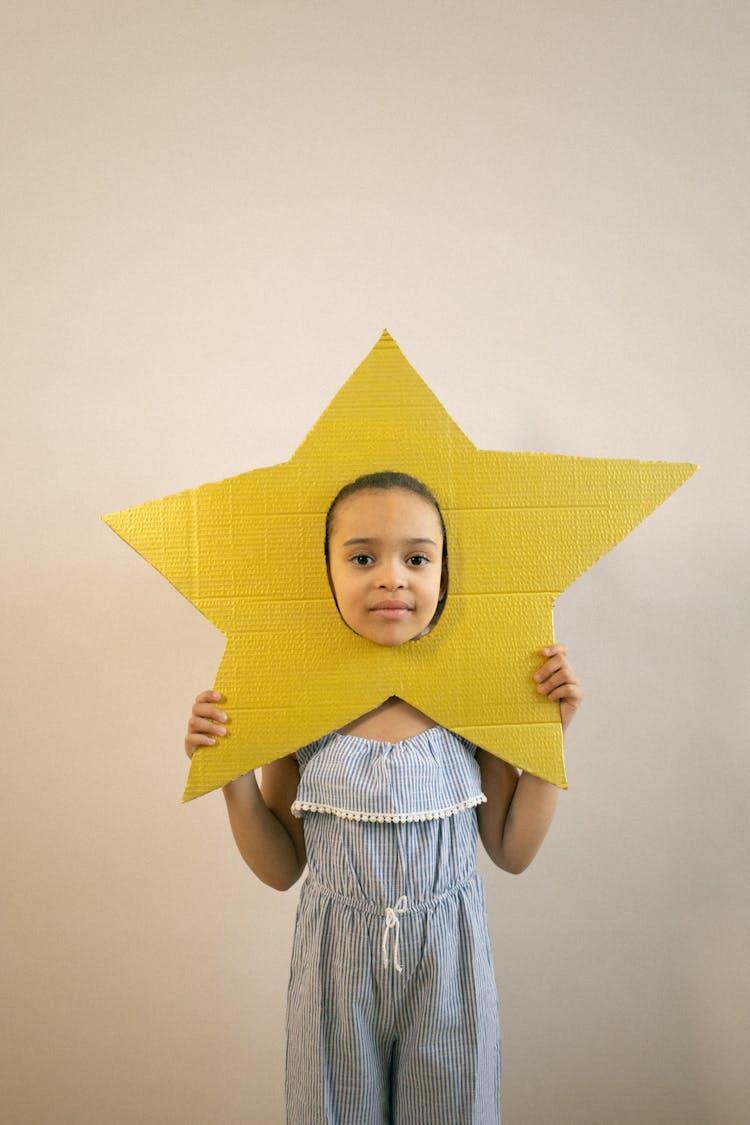 Cute Black Girl In Paper Star Mask