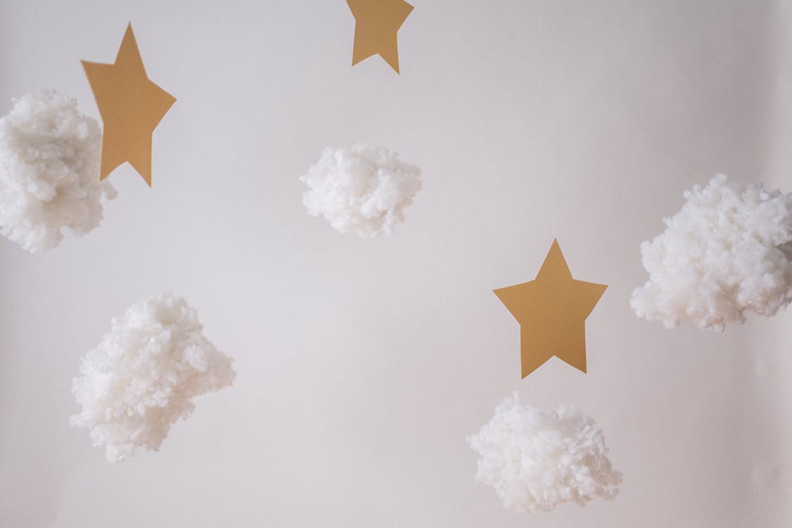 Decorated stars and cotton clouds · Free Stock Photo