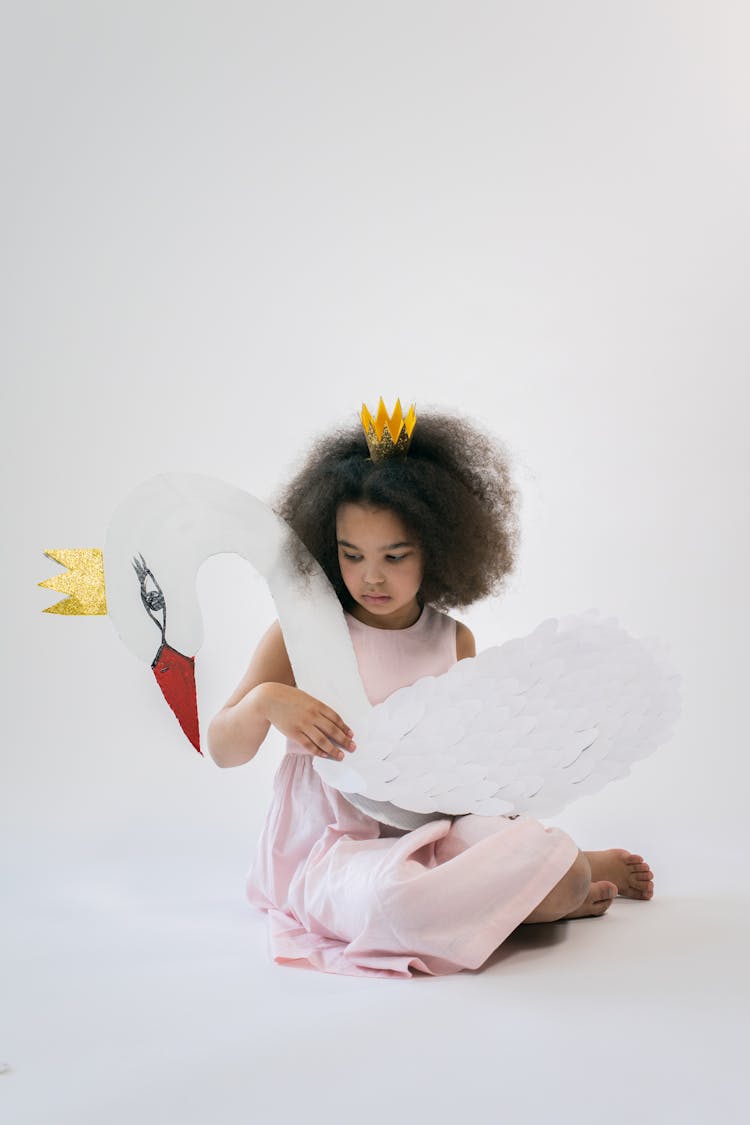 Cute Black Girl With Paper Swan