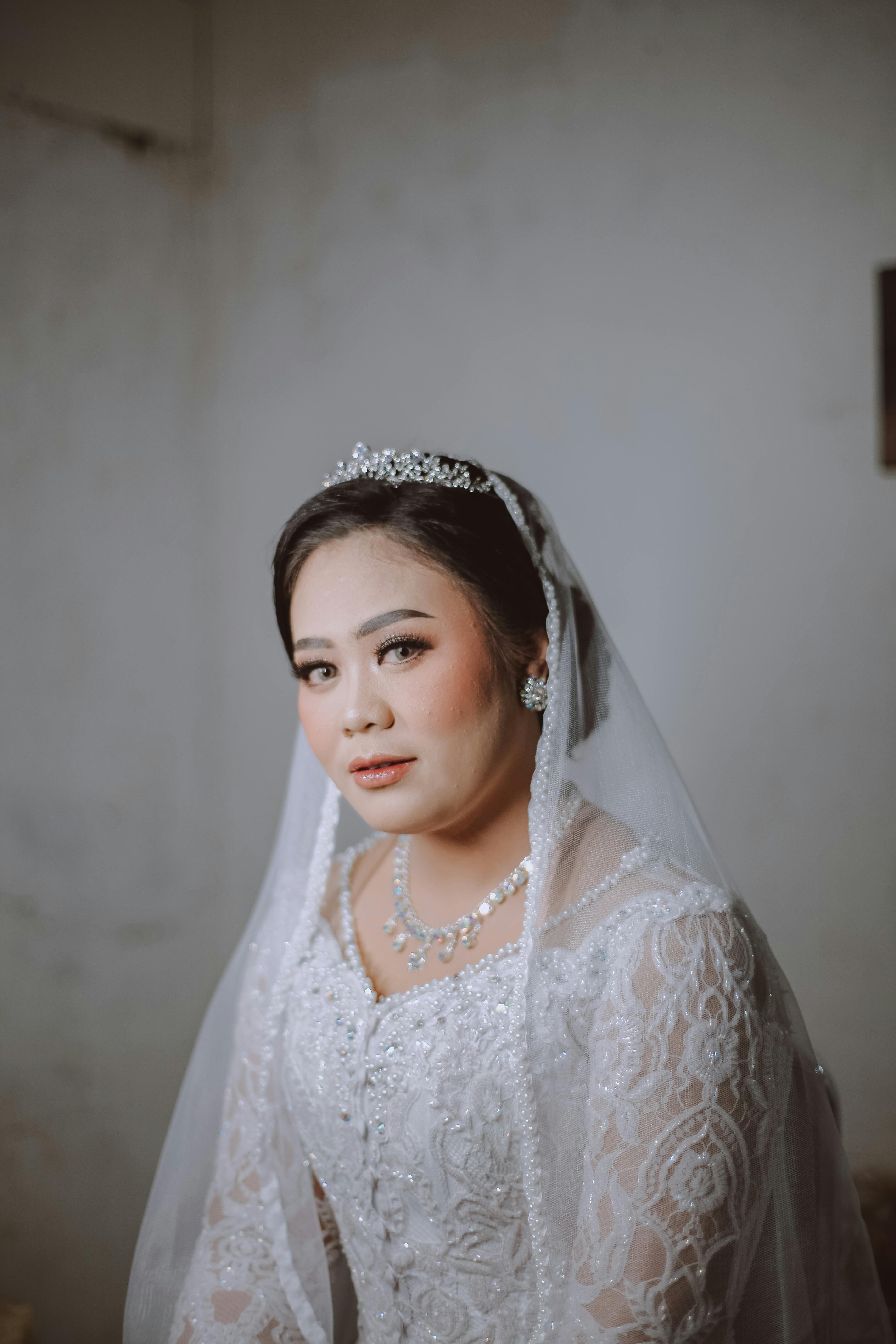 A Bride Wearing Her Wedding Dress · Free Stock Photo