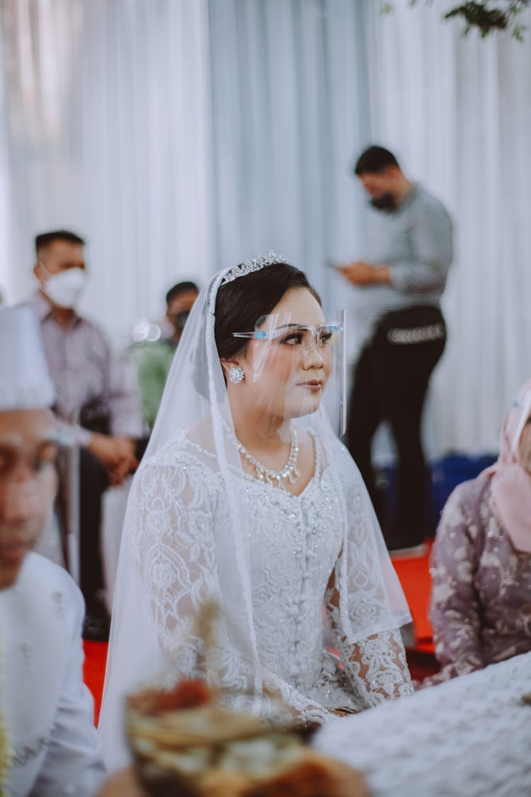 Bride In A Gown Wearing A Face Shield