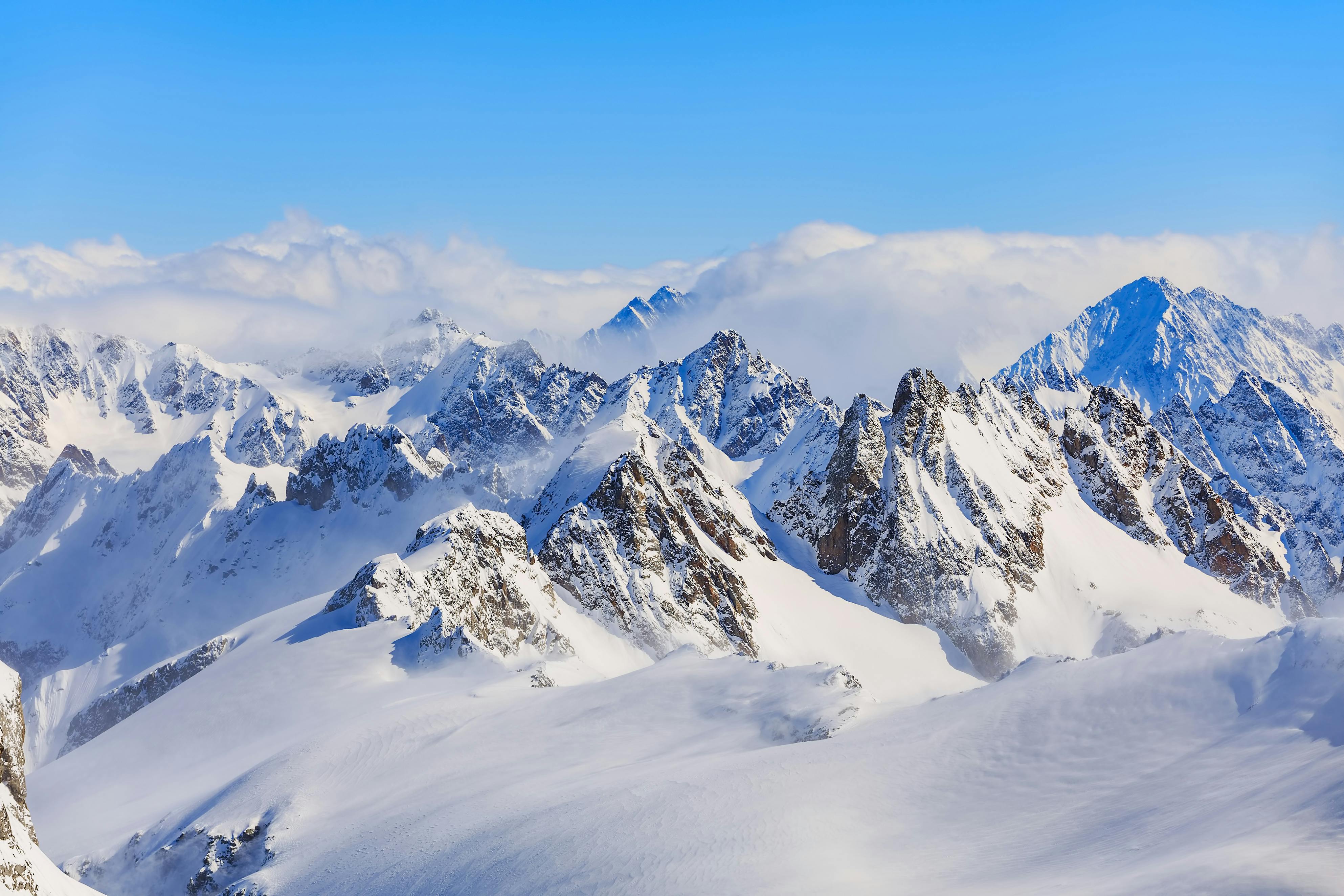 Mountain Ranges Covered in Snow · Free Stock Photo