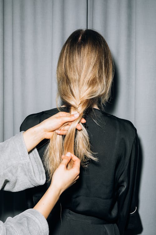 Free Back View of a Person With Blonde Hair Stock Photo