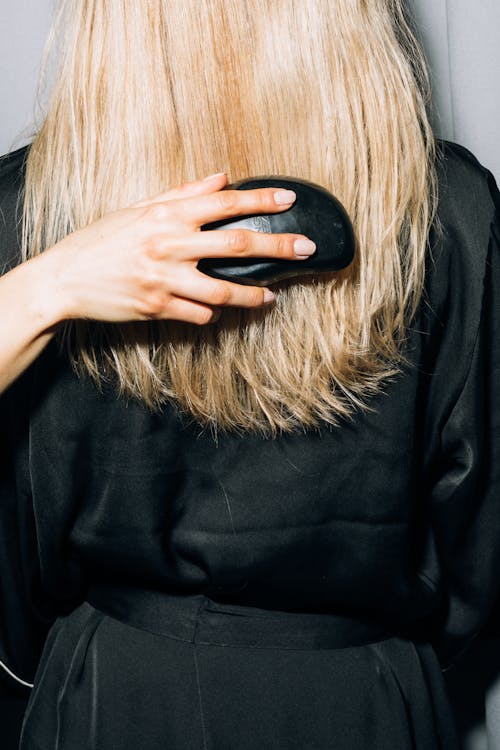 Free Back View of a Person With Blonde Hair Stock Photo