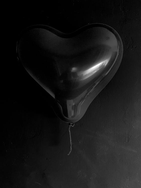 Grayscale Photo of Heart Shaped Balloon