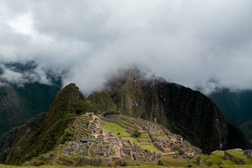 Aerial Shot of Mountains Covered with Clouds