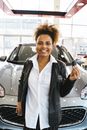 A Woman Holding a Car Key