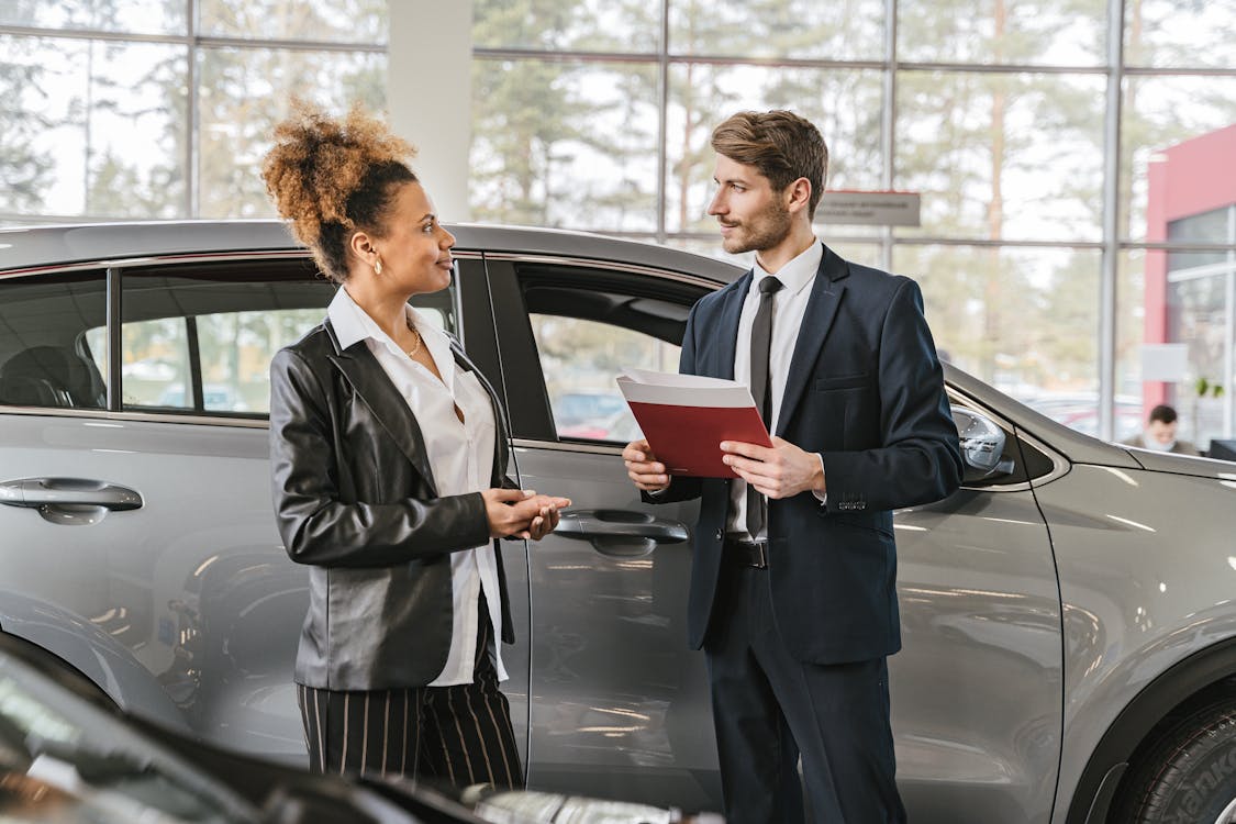 Free A Woman Buying a Car Stock Photo sell my lease
