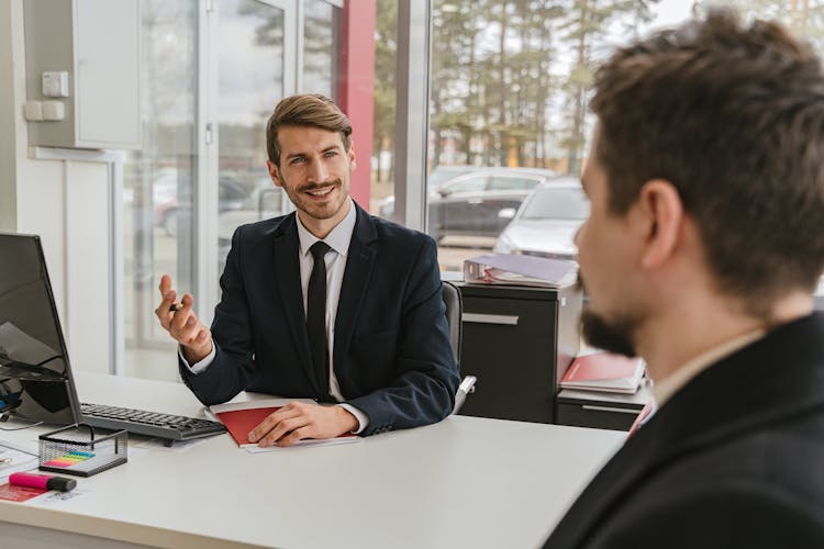 Businessman Talking With Client