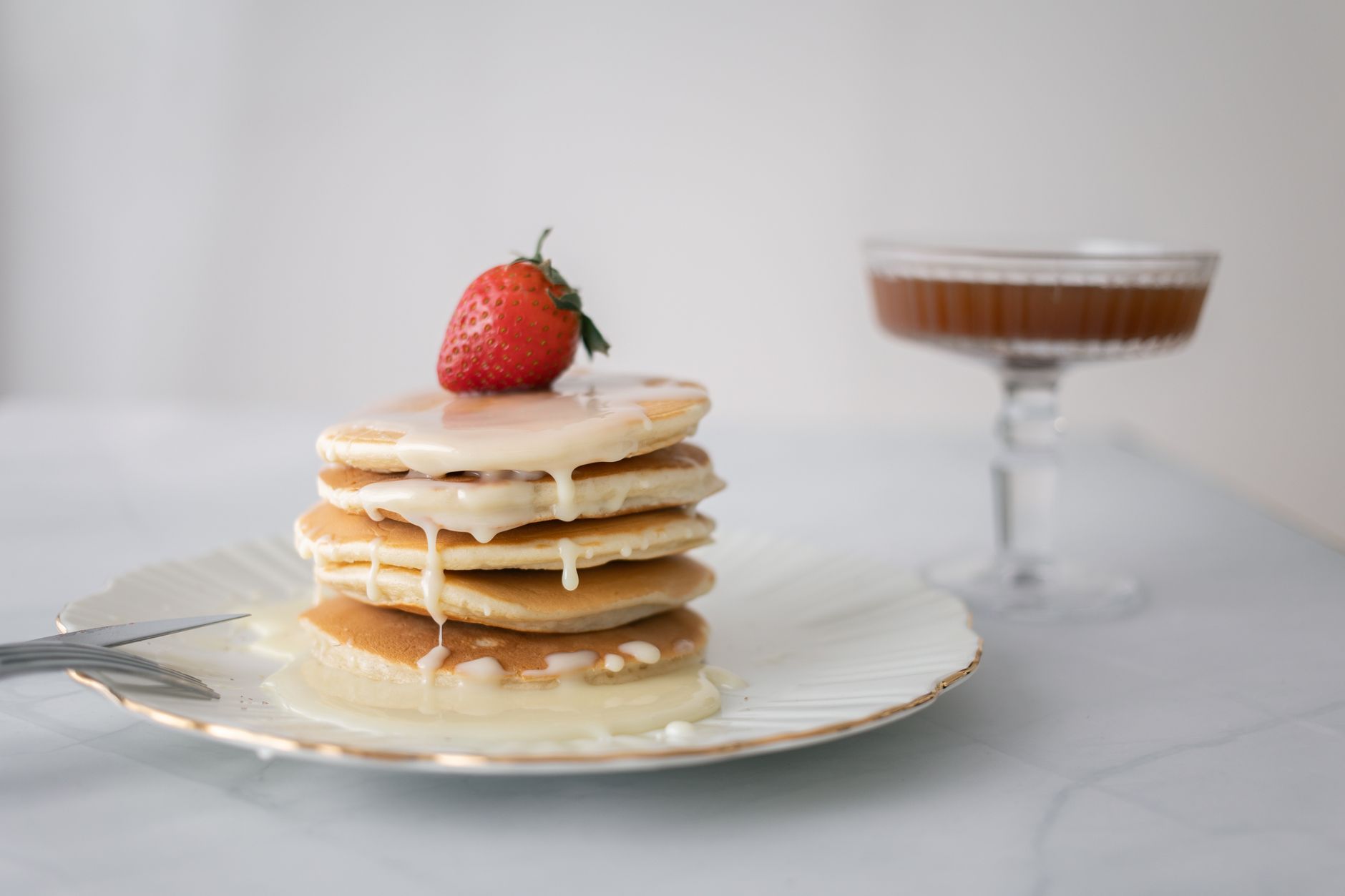 Whipped malt cream topping on pancakes