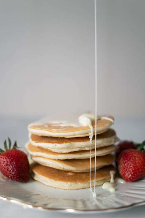 Free Pancakes and Red Strawberries on a Plate Stock Photo