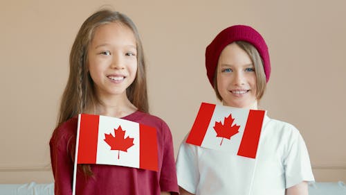 Kids Holding Canada Flag