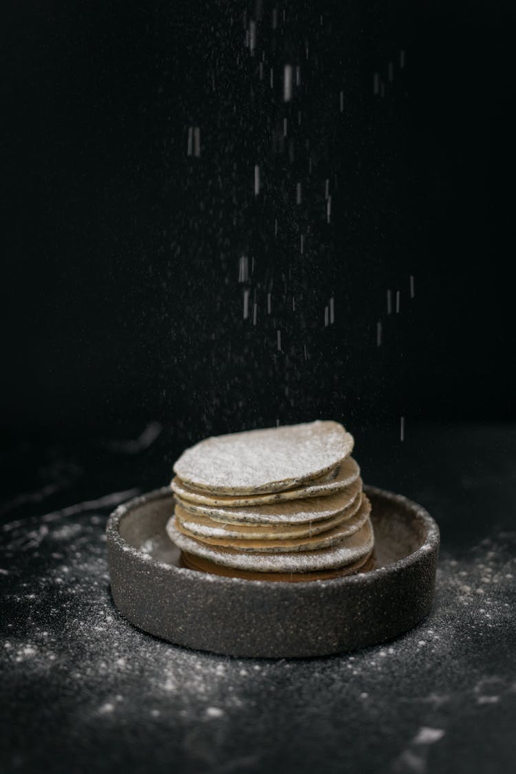 Powdered Sugar Sprinkling On Pancakes