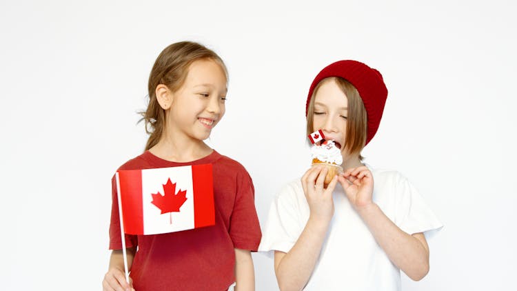 Kids Representing The Flag Of Canada