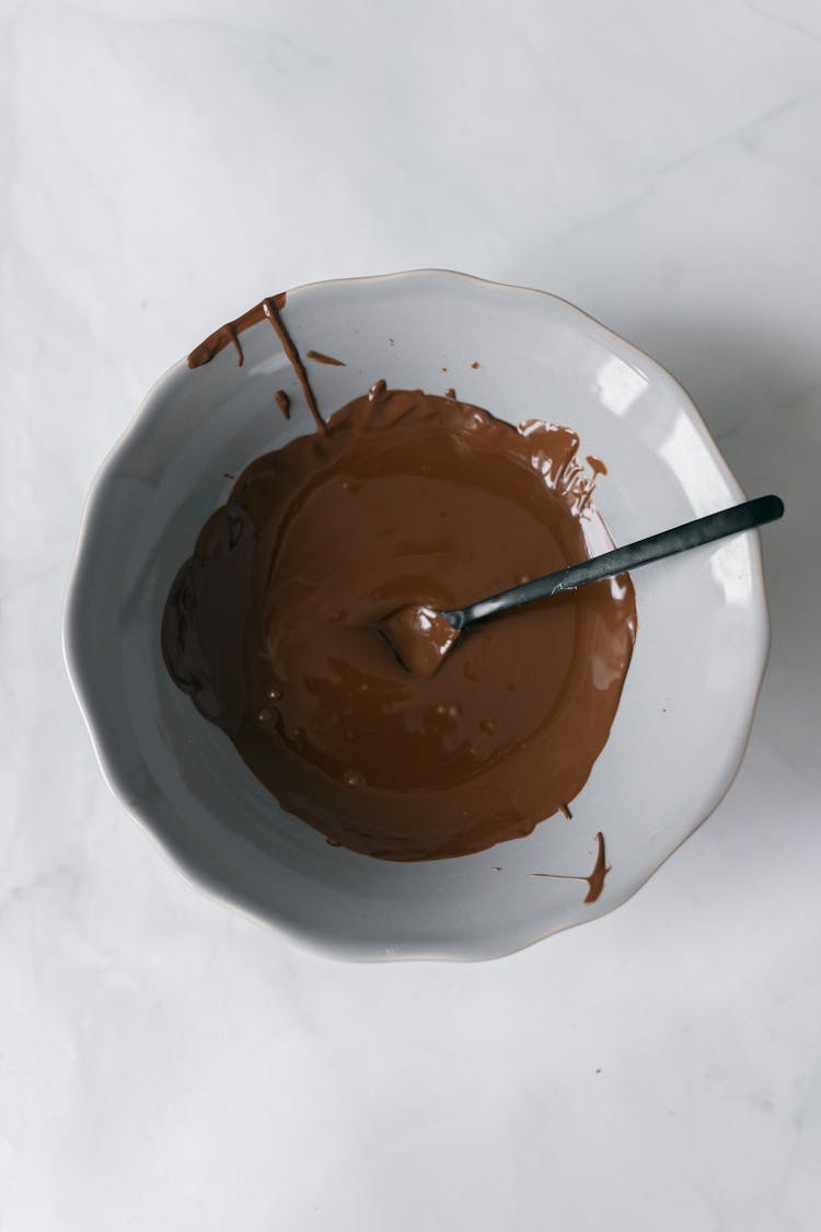 Melted Chocolate In White Bowl