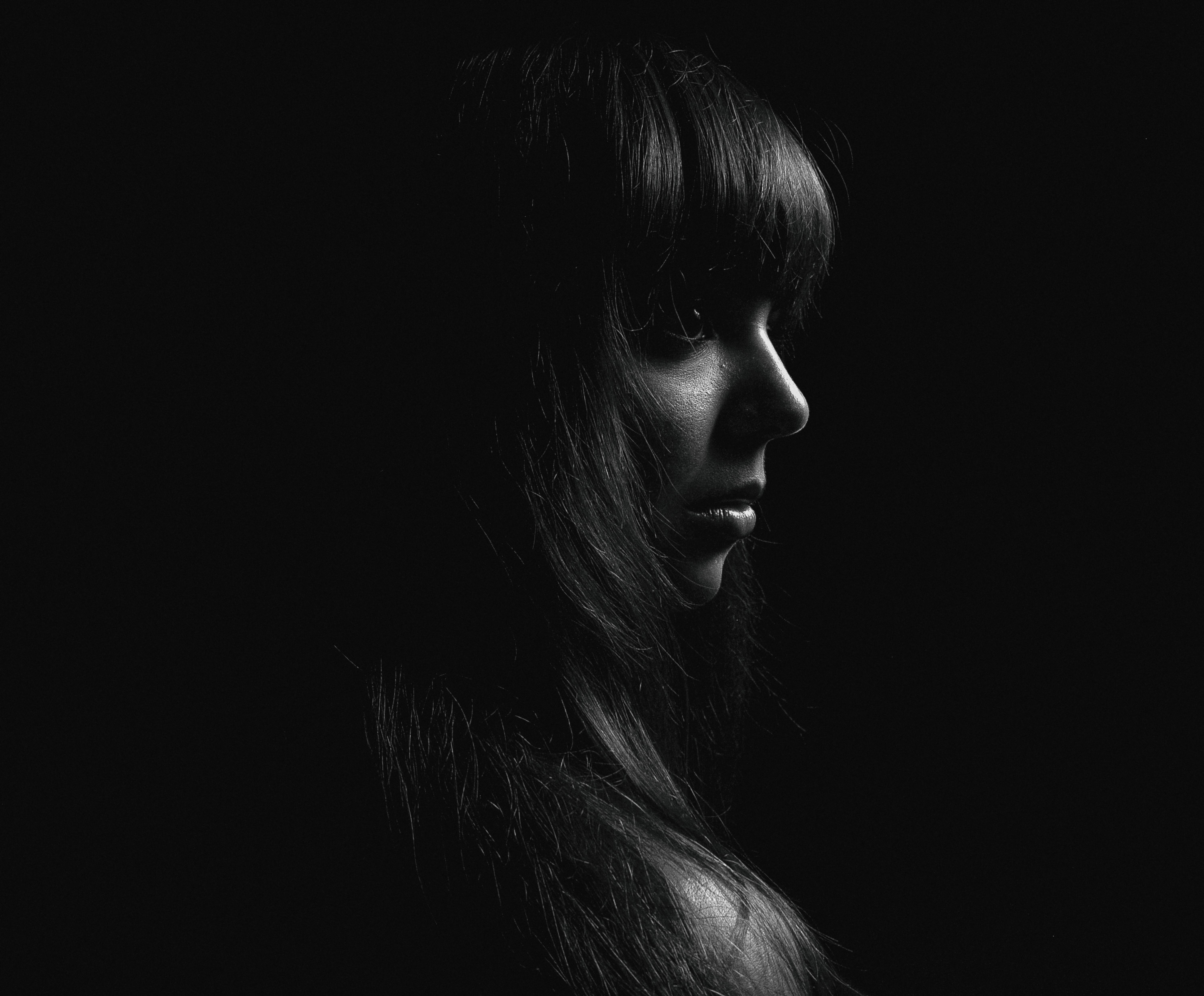 Black and White Photo of a Woman with Long Hair · Free Stock Photo