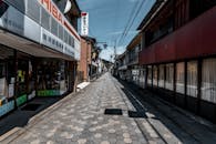 Empty Lane between Storefronts
