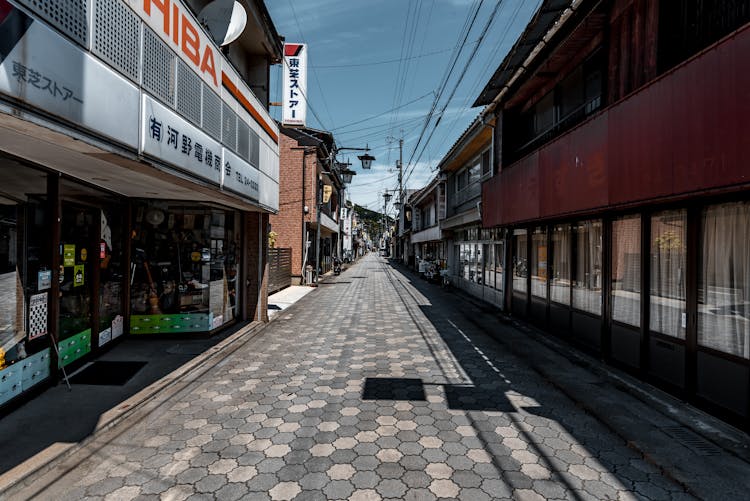 Empty Lane Between Storefronts