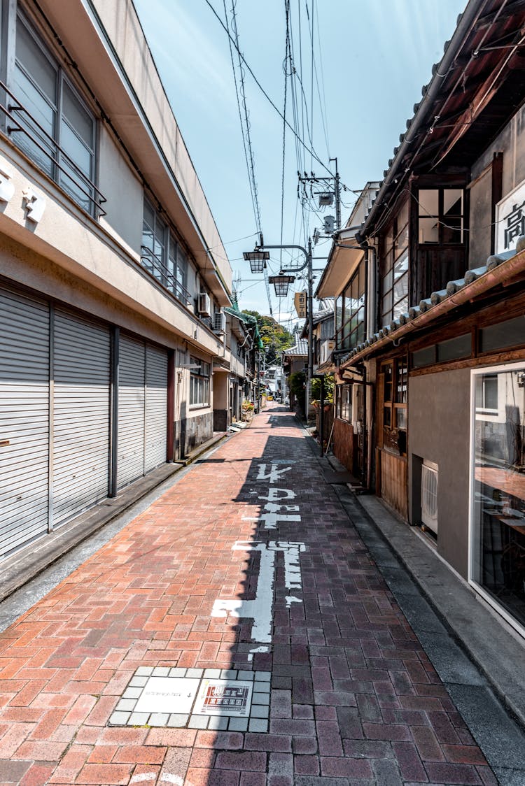 Empty Lane Between Storefronts