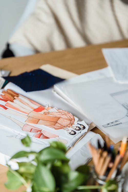 Cutout sketches of modern cloth in atelier