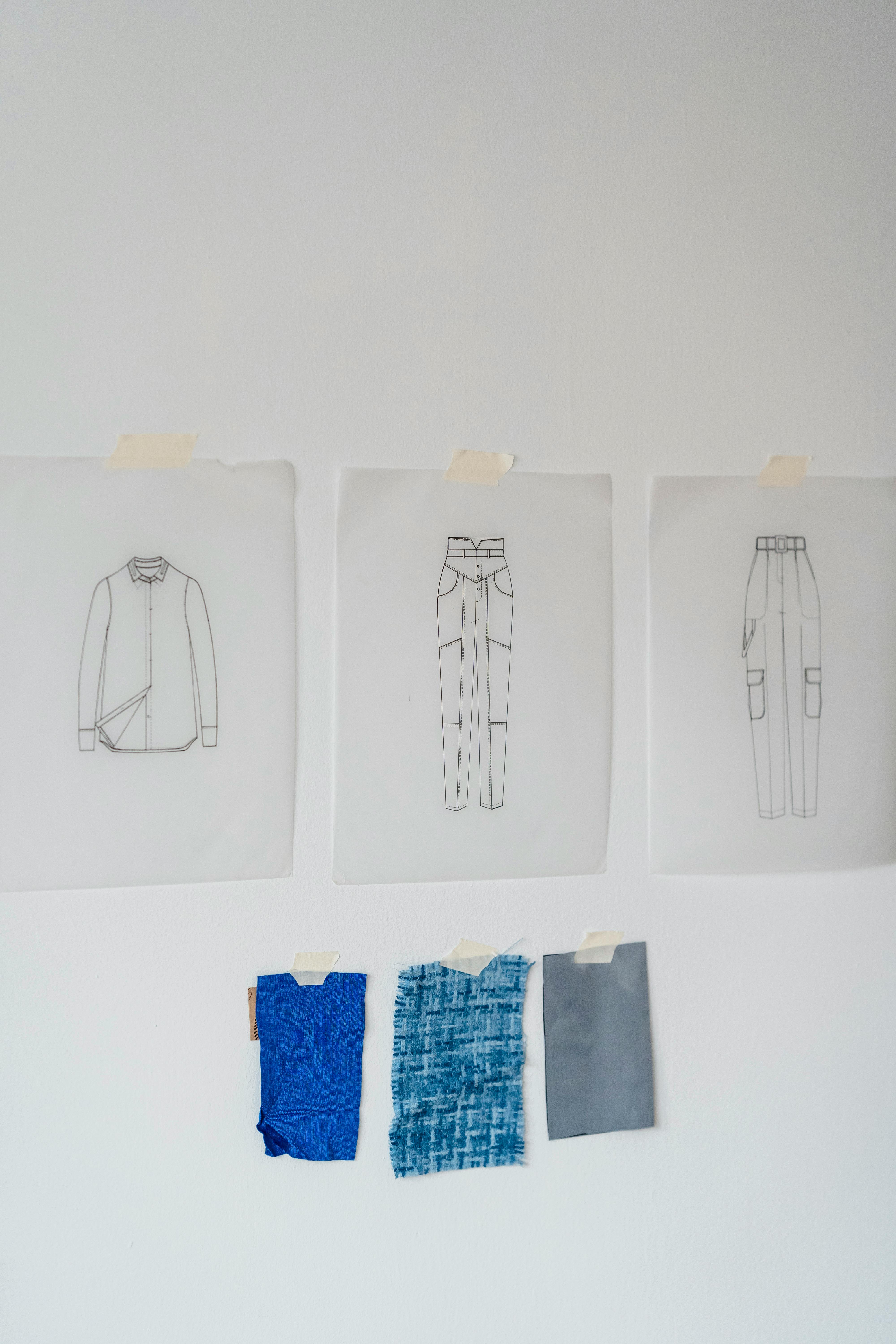 fashion sketches hanging on wall