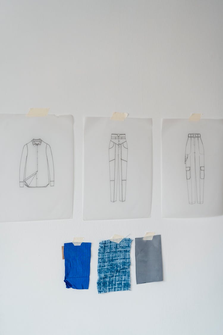 Fashion Sketches Hanging On Wall