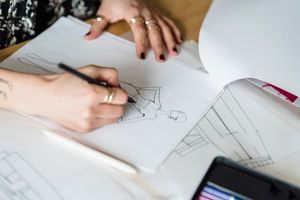 Designer drawing a garment draft — Michael Burrows on Pexels
