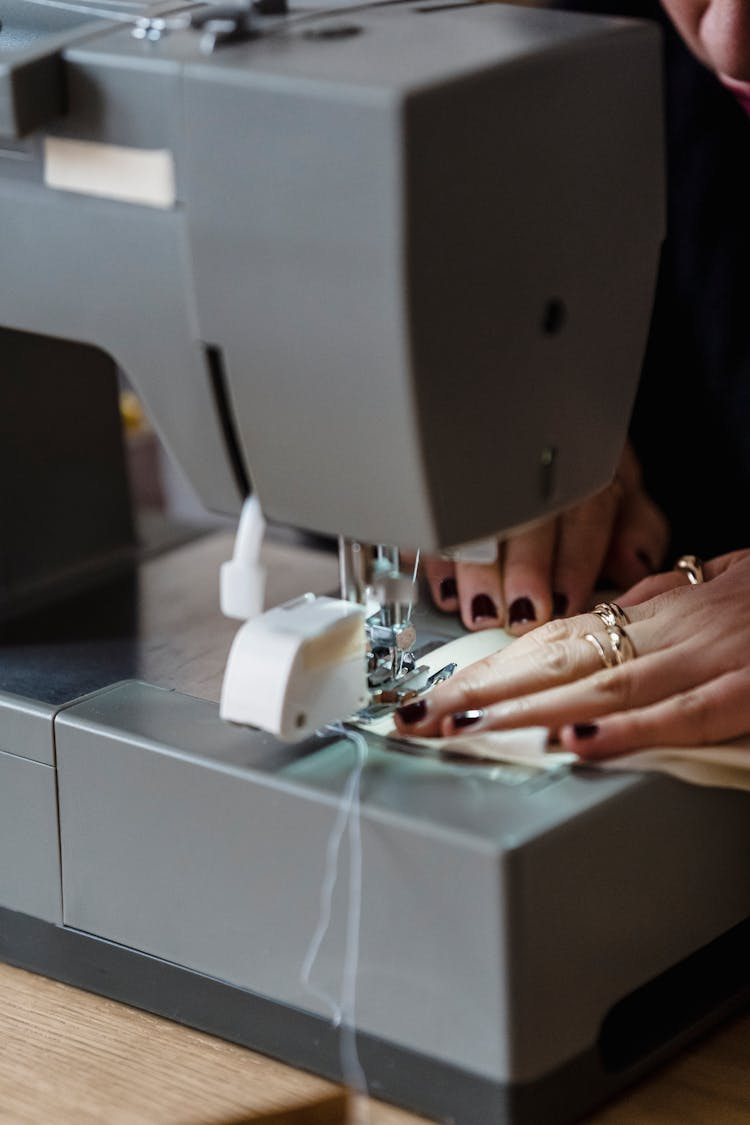 Unrecognizable Seamstress Using Sewing Machine