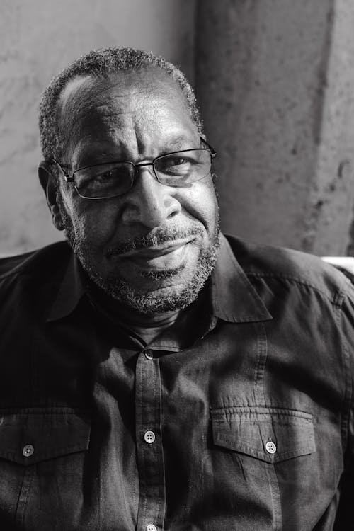Gratis arkivbilde med afrikansk-amerikansk mann, ansiktshår, briller Arkivbilde