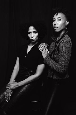 Monochrome portrait of two women with curly hair — RDNE Stock project on Pexels